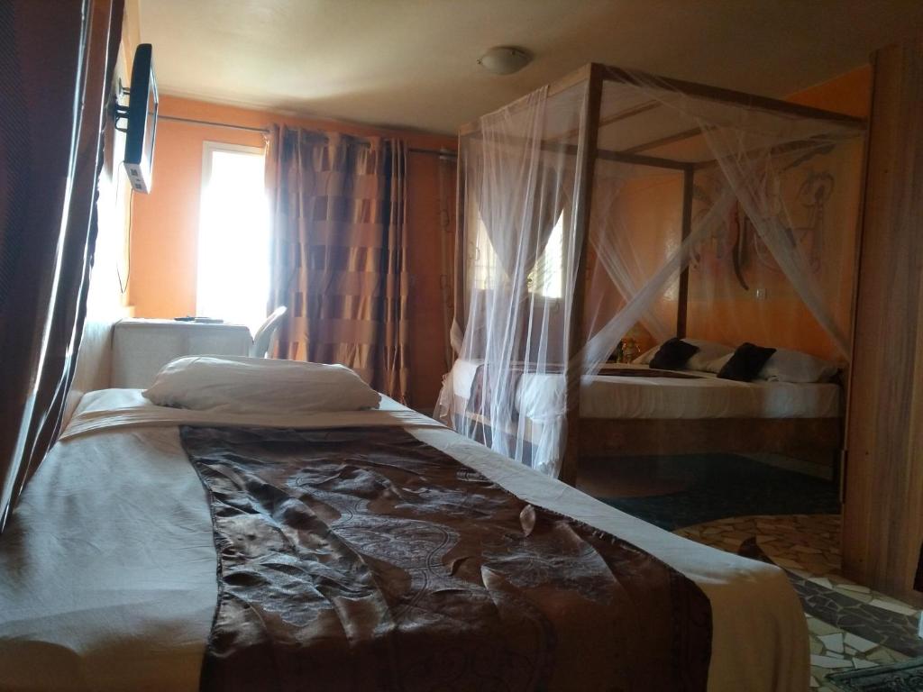 Chambre Quadruple - HOTEL AFRICA 6 PLAGE